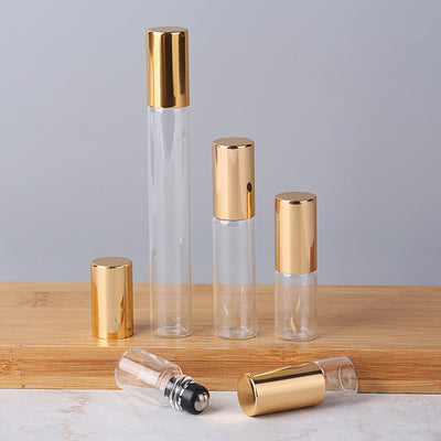 Wholesale Aromatherapy Perfume Roll-on Round Glass with Gold Cap 10ml in Singapore - playthecandle